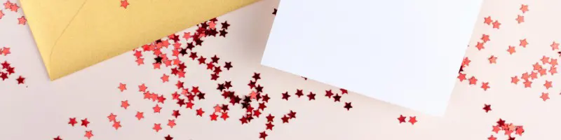 Invitation paper surrounded by red stars.